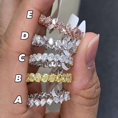 IGI Certified Natural EF Color VVS-VS Clarity calbrated oval shape full eternity ring in 18k white gold